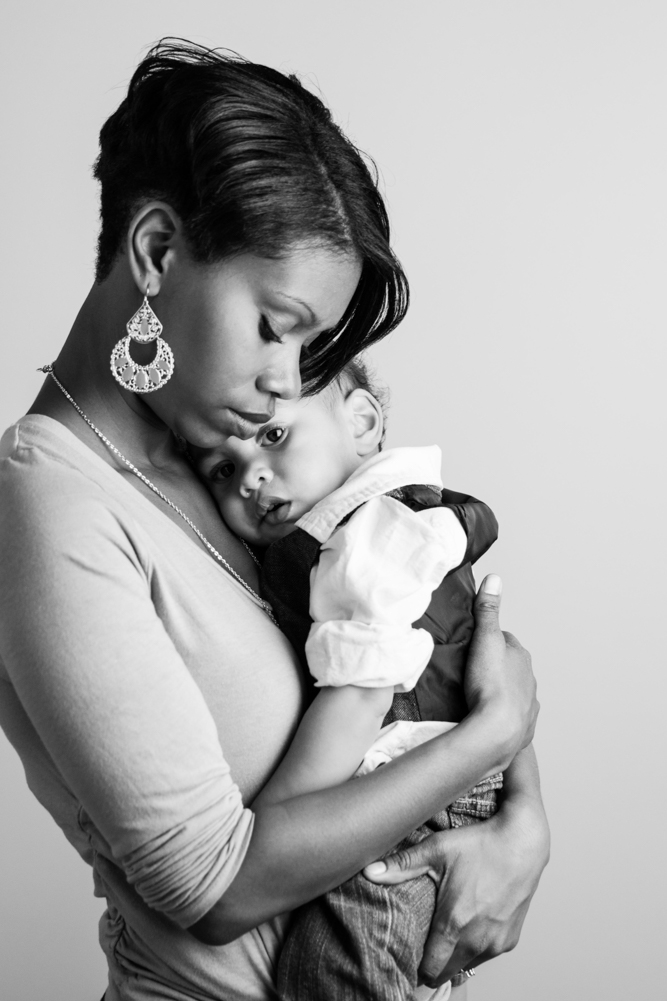 pretty mom holding baby boy