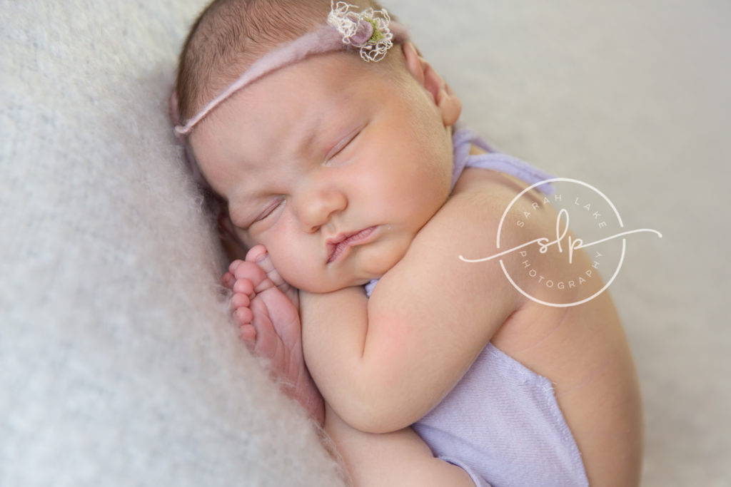 sleeping baby girl with headband