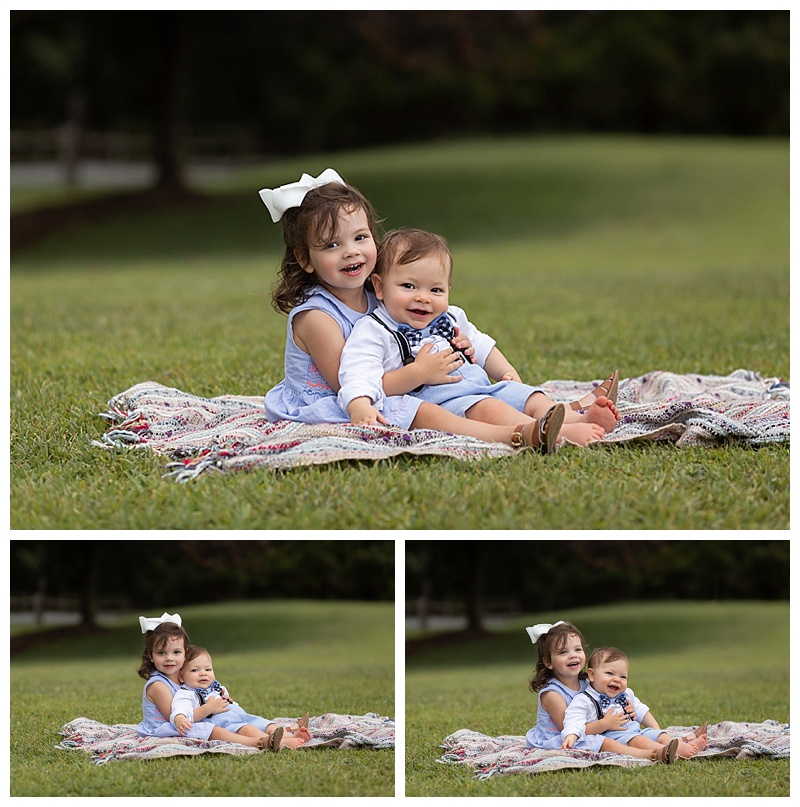 little girl hugging her baby brother