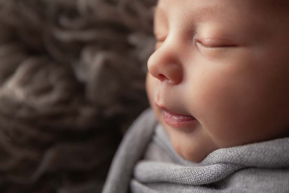 profile of newborn boy's face