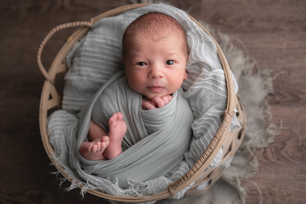 cute newborn looking at camera