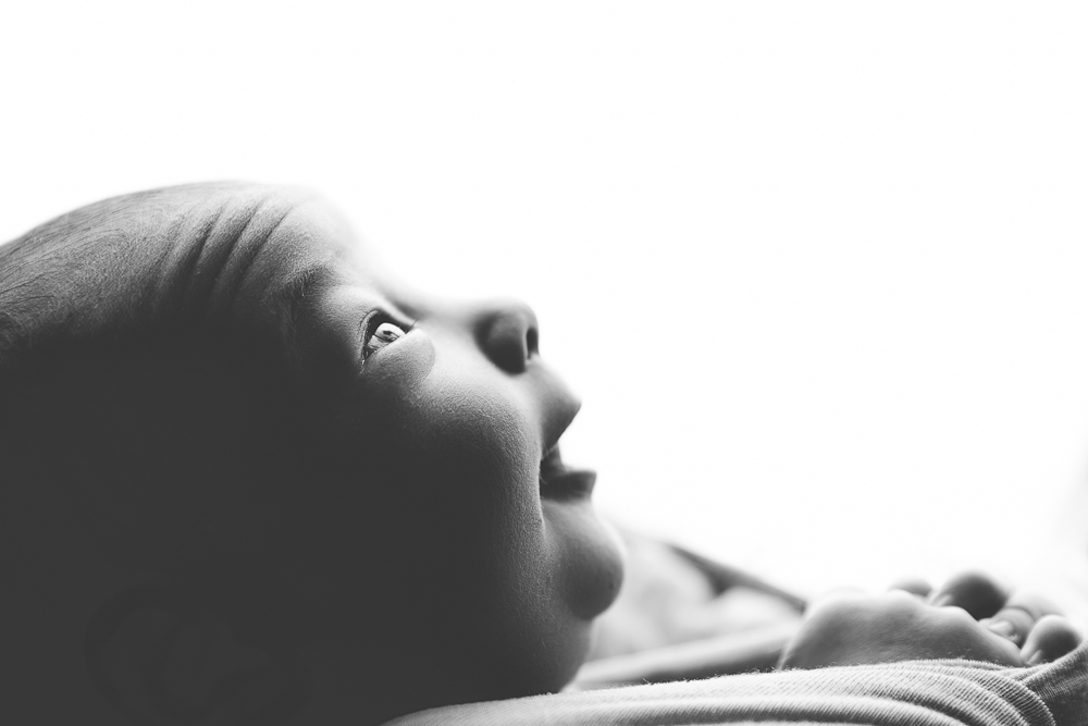 black and white profile of newborn baby