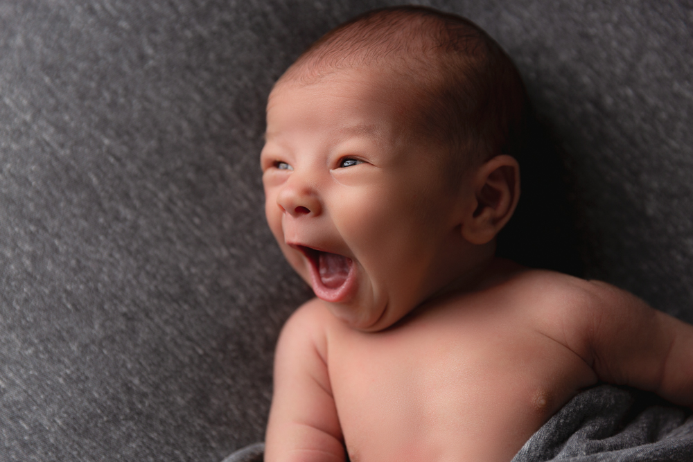 yawning newborn baby