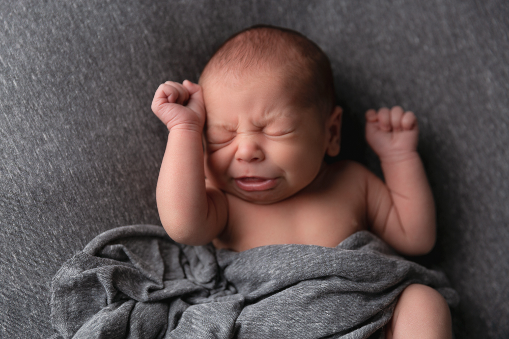 sneezing newborn baby